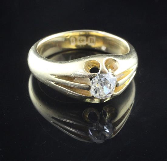 A George V 18ct gold and claw set solitaire diamond ring, size O.